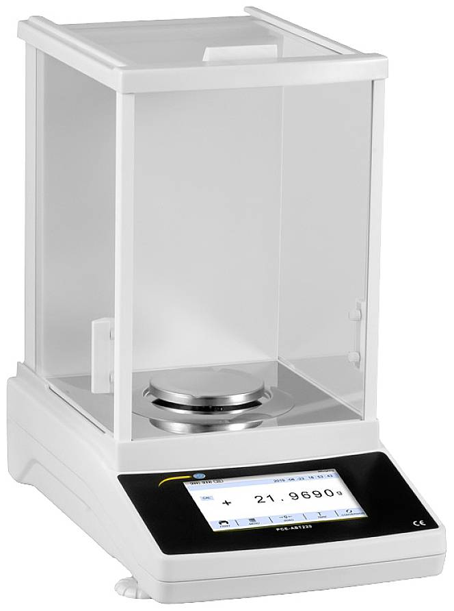 Eine digitale Präzisionswaage mit einem Display zeigt das Gewicht 21,9690 g an. Sie ist von einem Schutzgehäuse umgeben.
