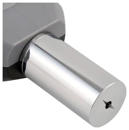 Nahaufnahme eines glänzenden, zylindrischen Metallwerkzeugs oder einer Welle mit abgerundetem Ende und kleinem zentralem Loch, angebracht an einem grauen Gehäuse.