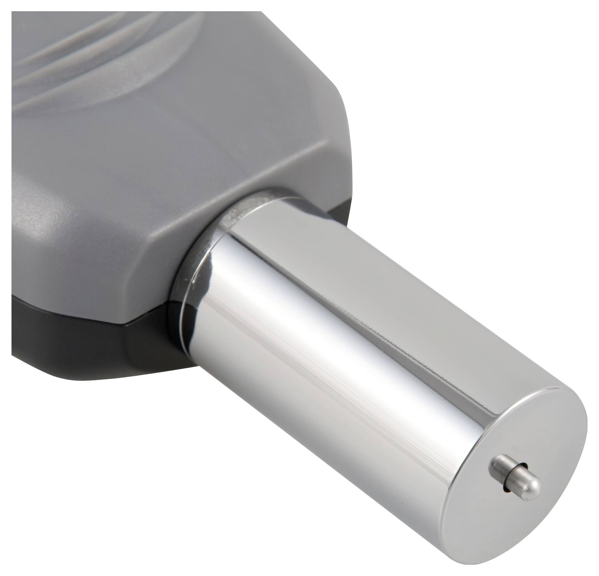 Nahaufnahme eines grau und silberfarbenen mechanischen Geräts mit einer zylindrischen Metallwelle, die sich aus einem Gehäuse erstreckt.
