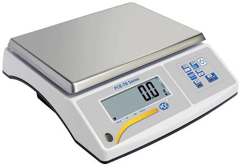 Elektronische Tischwaage mit digitalem Display zeigt '0.0'. Bedienfeld mit mehreren Tasten für Gewichtseinstellungen.