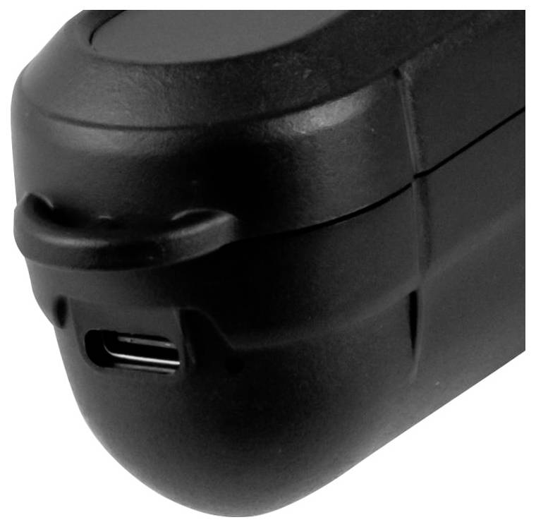 Nahaufnahme einer schwarzen Gerätebasis oder eines Griffs mit sichtbarem USB-Ladeanschluss auf weißem Hintergrund.