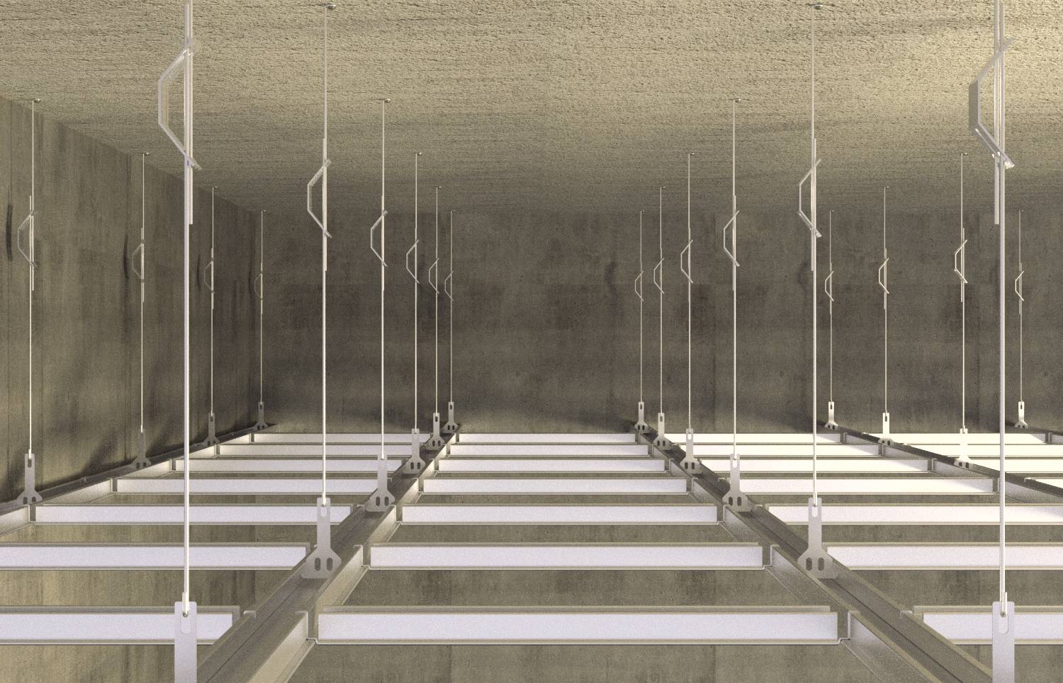 Verlegte Tragprofile aus Stahl in einem Betonraum, von oben fotografiert. Es sind Aufhängungen und befestigte Ketten sichtbar.