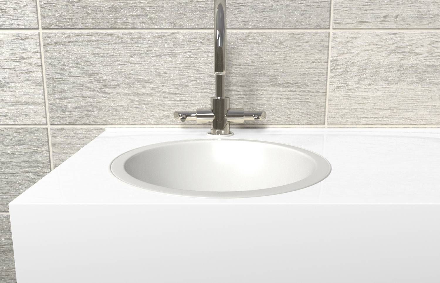 Ein modernes Badezimmerwaschbecken mit einem silbernen Wasserhahn, eingebaut in eine weiße Arbeitsplatte, vor grauen Wandfliesen.