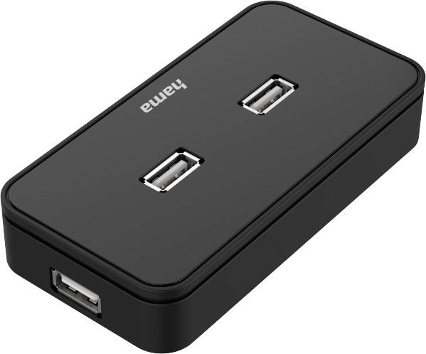 Ein schwarzer USB-Hub mit drei USB-Anschlüssen, zwei oben und einer an der Seite.