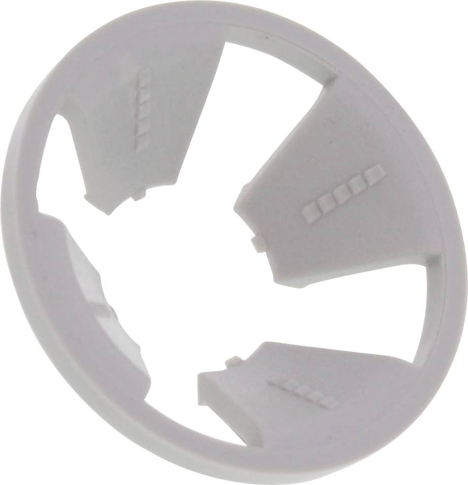 Ein weißer Plastikring mit vier symmetrischen Ausschnitten, möglicherweise ein Teil eines größeren Geräts.