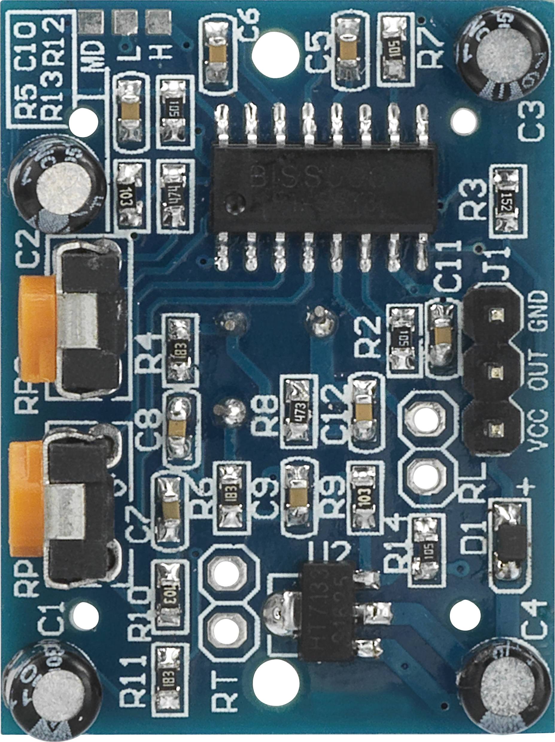 Elektronische Schaltung auf einer blauen Leiterplatte, enthält verschiedene Widerstände, Kondensatoren und integrierte Schaltkreise.
