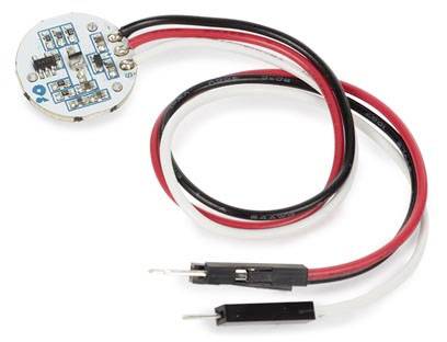 Ein rundes, elektronisches Modul mit Kabeln und Steckverbindern, wahrscheinlich für technische oder elektronische Anwendungen.