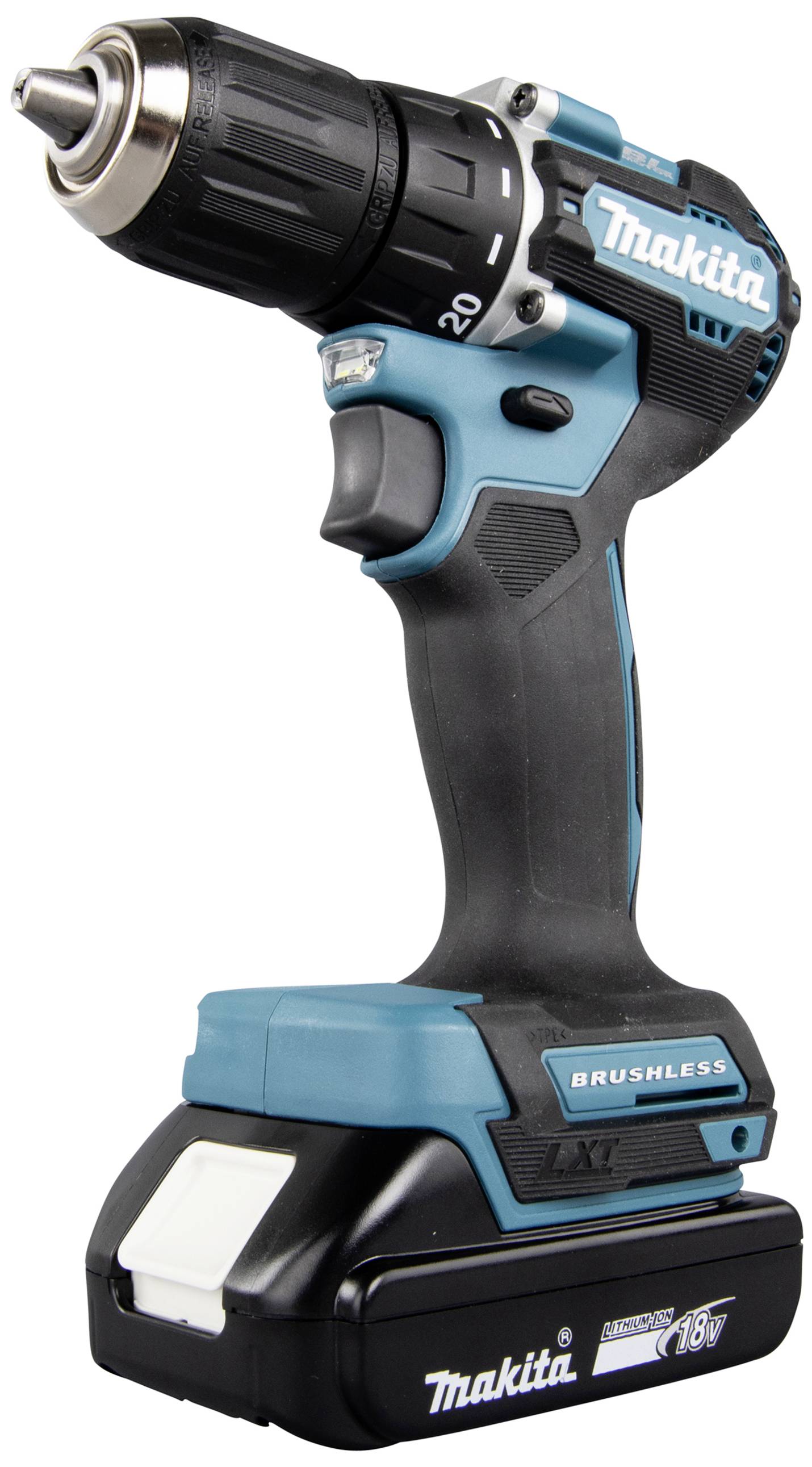 Ein kabelloser, blauer Akkuschrauber der Marke Makita, stehend auf einem Tisch, mit einem schwarzen Griff und einem 18V-Akku.