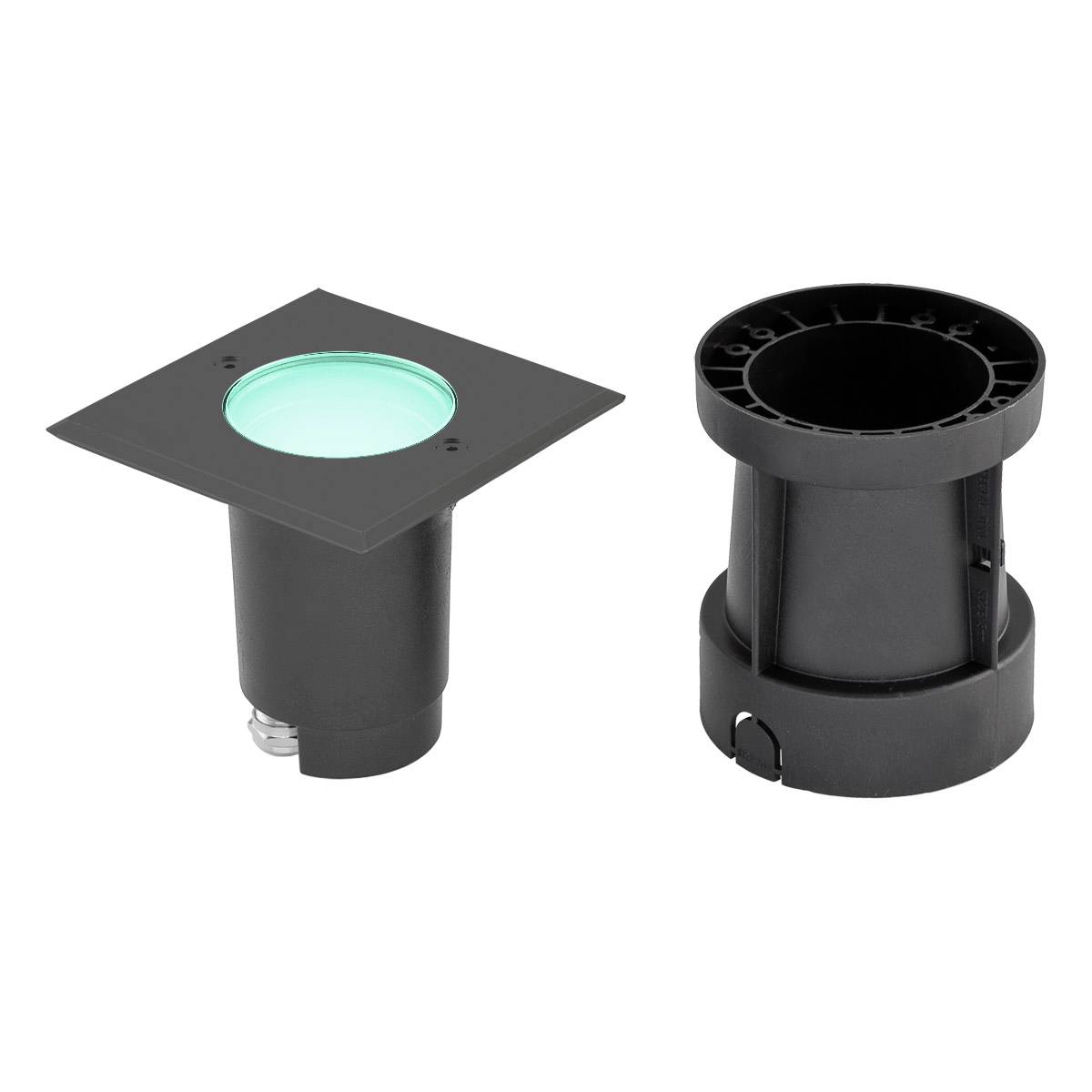 Ein rechteckiger Bodeneinbaustrahler mit grünem Licht und schwarzem Gehäuse, daneben ein rundes schwarzes Montageelement.