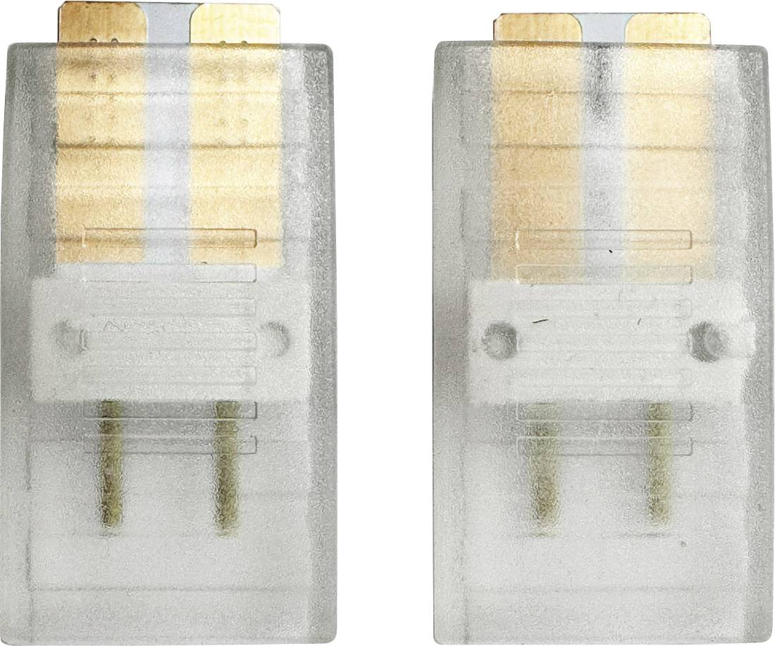 Röntgenaufnahme von zwei identischen elektronischen Steckern oder Steckverbindern nebeneinander, die interne Metallstifte und Verdrahtung durch durchscheinende Kunststoffgehäuse zeigen.