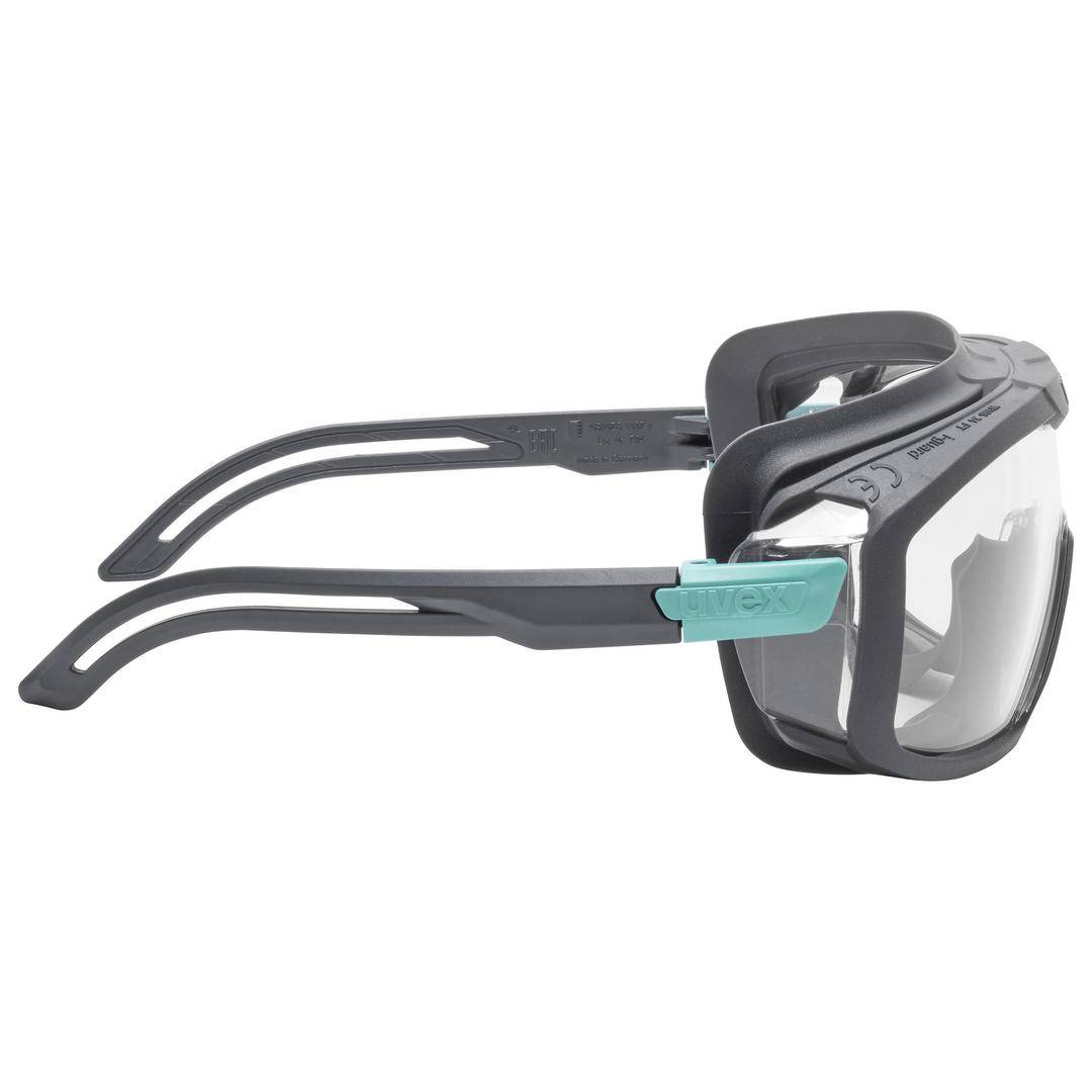 Schwarze Schutzbrille mit klaren Gläsern und türkisfarbenem Detail an den Bügeln, geeignet für Arbeitsschutzanwendungen.