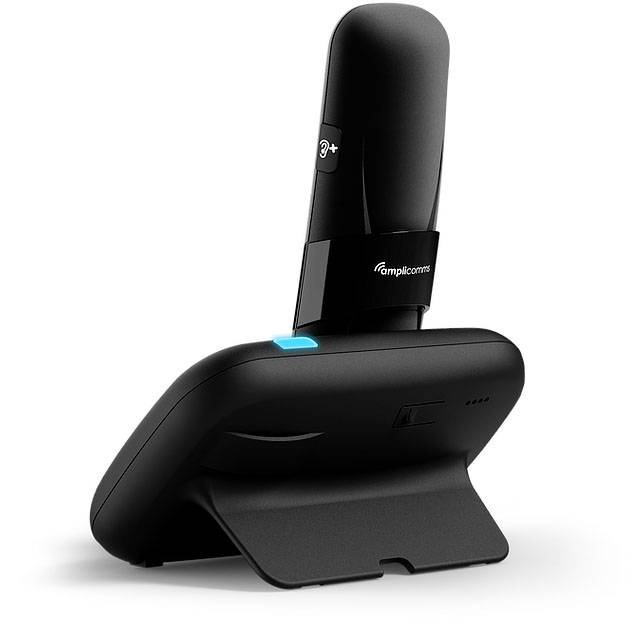 Ein schnurloses Telefon mit Ladestation, schwarz, aufrecht stehend. Enthält ein Symbol auf der Seite für Lautstärkeanpassung.