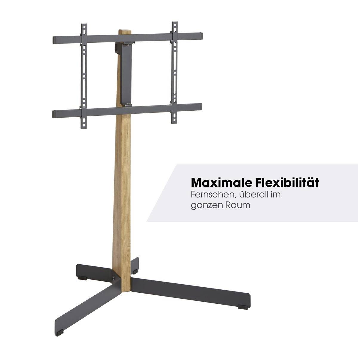 TV-Ständer aus Holz und Metall mit minimalistischem Design. Text zeigt: 'Maximale Flexibilität – Fernsehen, überall im ganzen Raum'.
