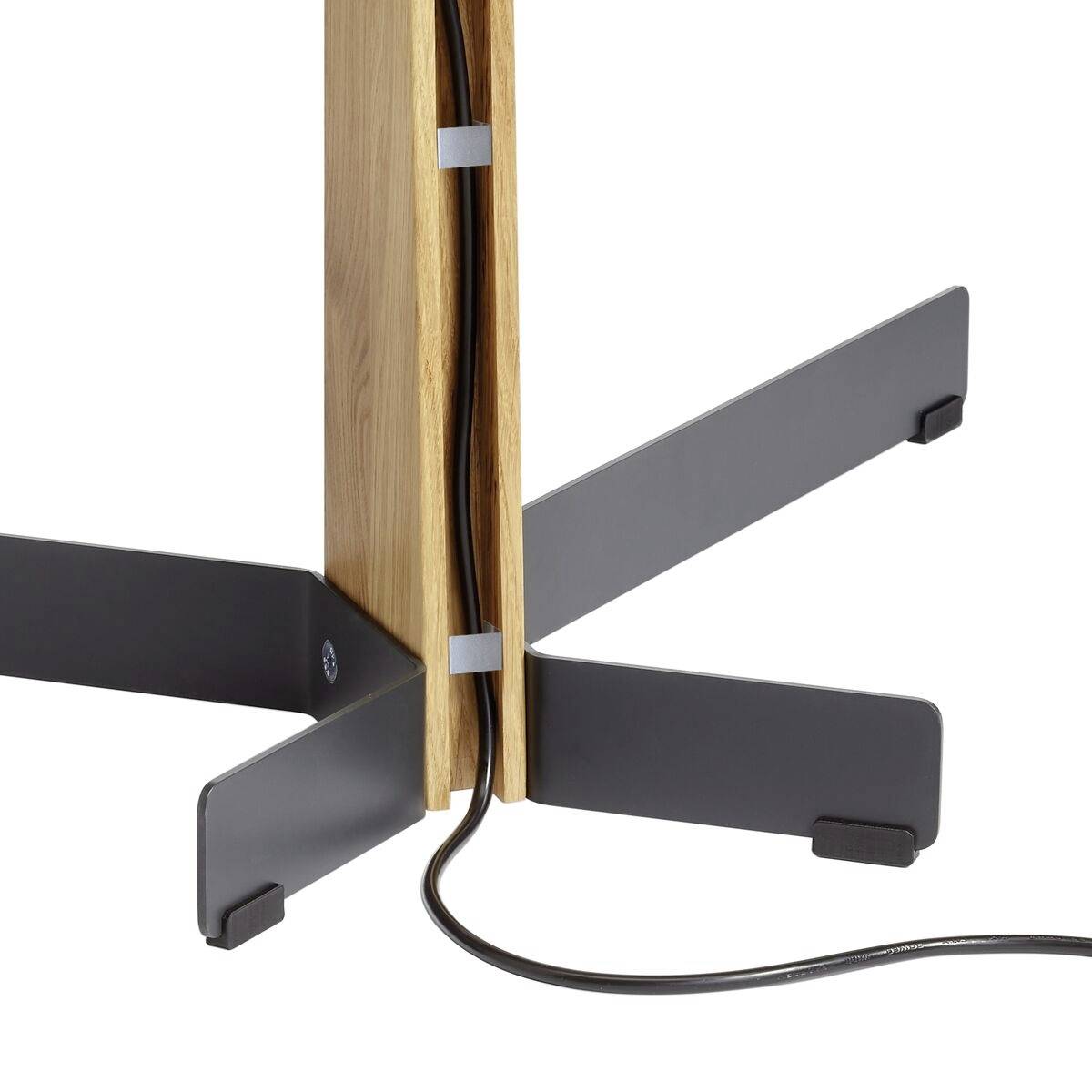 Ein Holztischbein mit Kabel, das entlang der Innenseite befestigt ist. Schwarze Metallstandfüße sorgen für Stabilität.