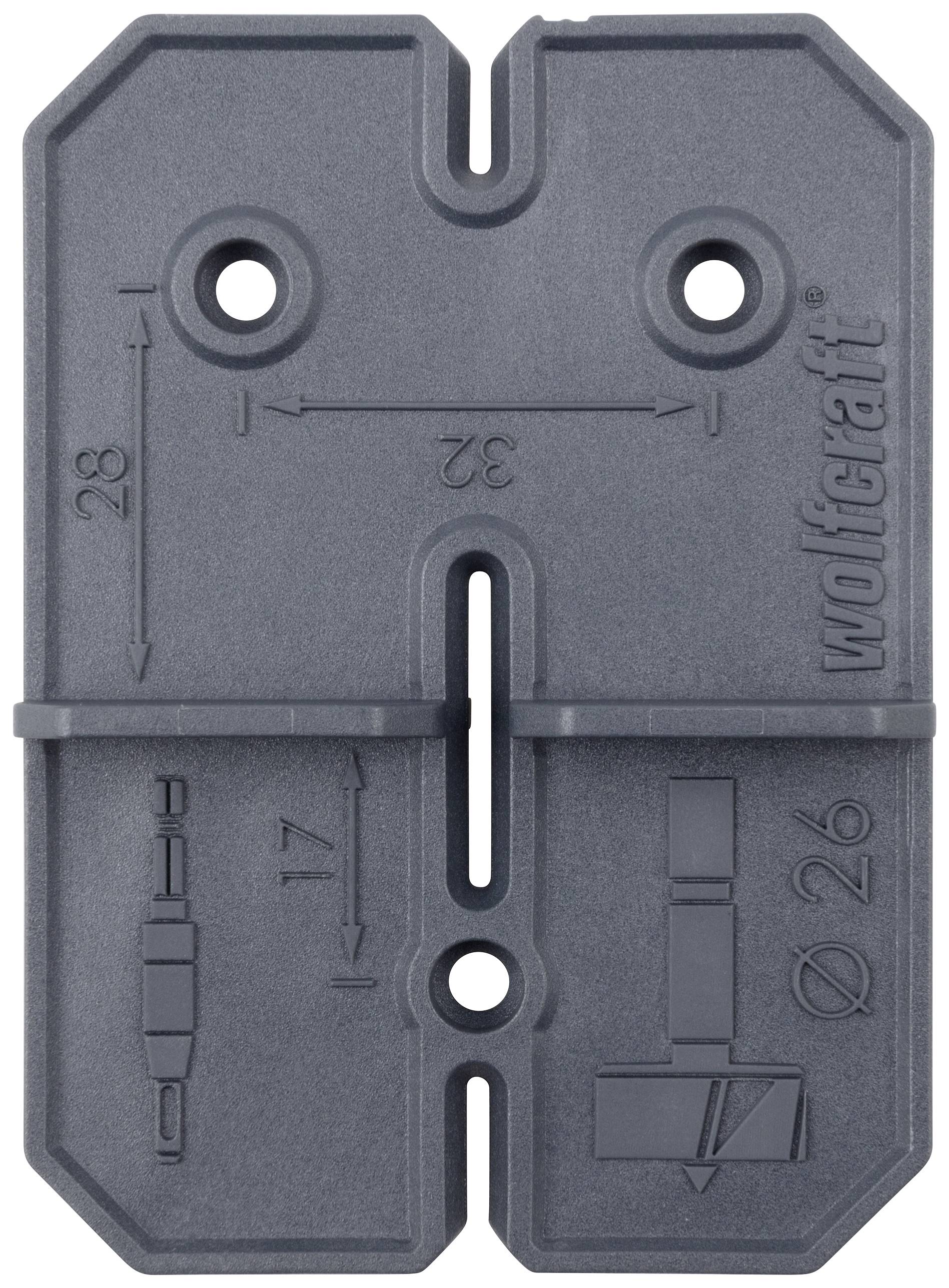Bohrschablone mit einfachen Symbolen und Maßeinheiten in Millimetern für präzises Bohren. Links 'ø 17', rechts 'ø 26', mittig '32'.