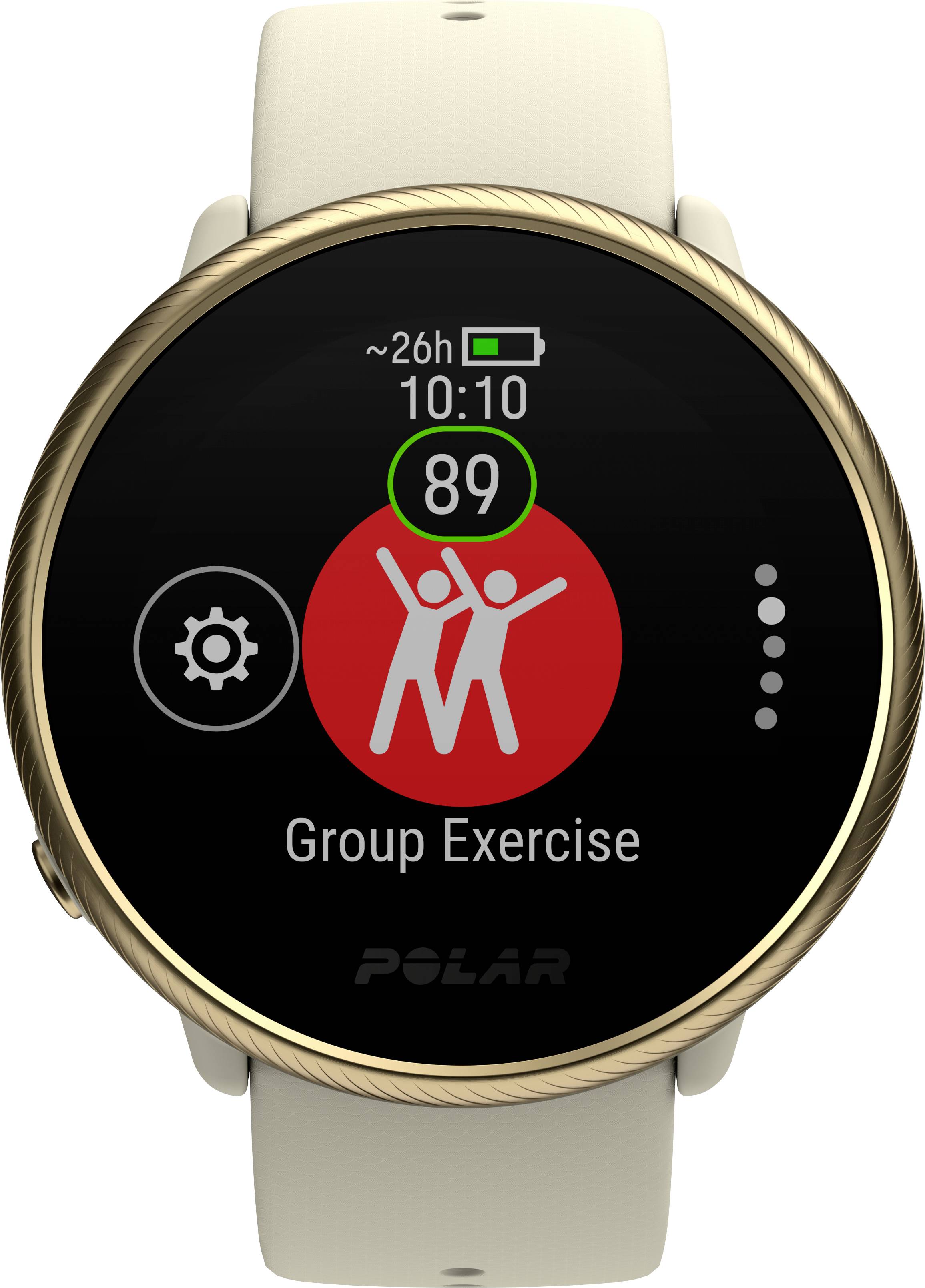 Eine Smartwatch zeigt die Anzeige 'Group Exercise' mit einer roten Grafik von zwei Personen, 89 Herzfrequenz und ~26h Akkulaufzeit.