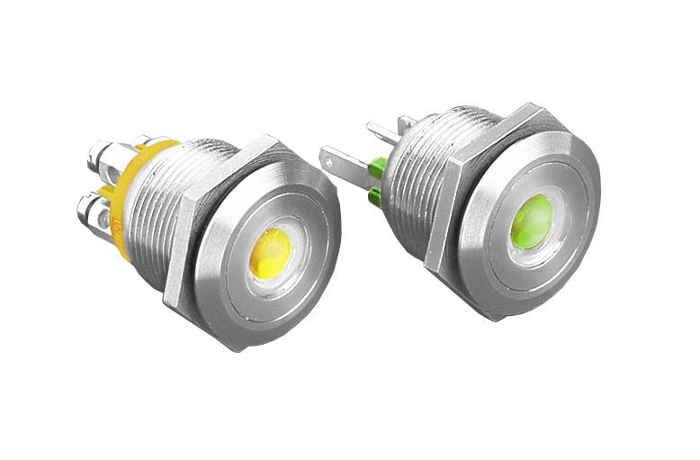 Zwei metallische Drucktaster mit LED-Beleuchtung: der linke gelb und der rechte grün. Sie sind für den Einbau in Geräte vorgesehen.