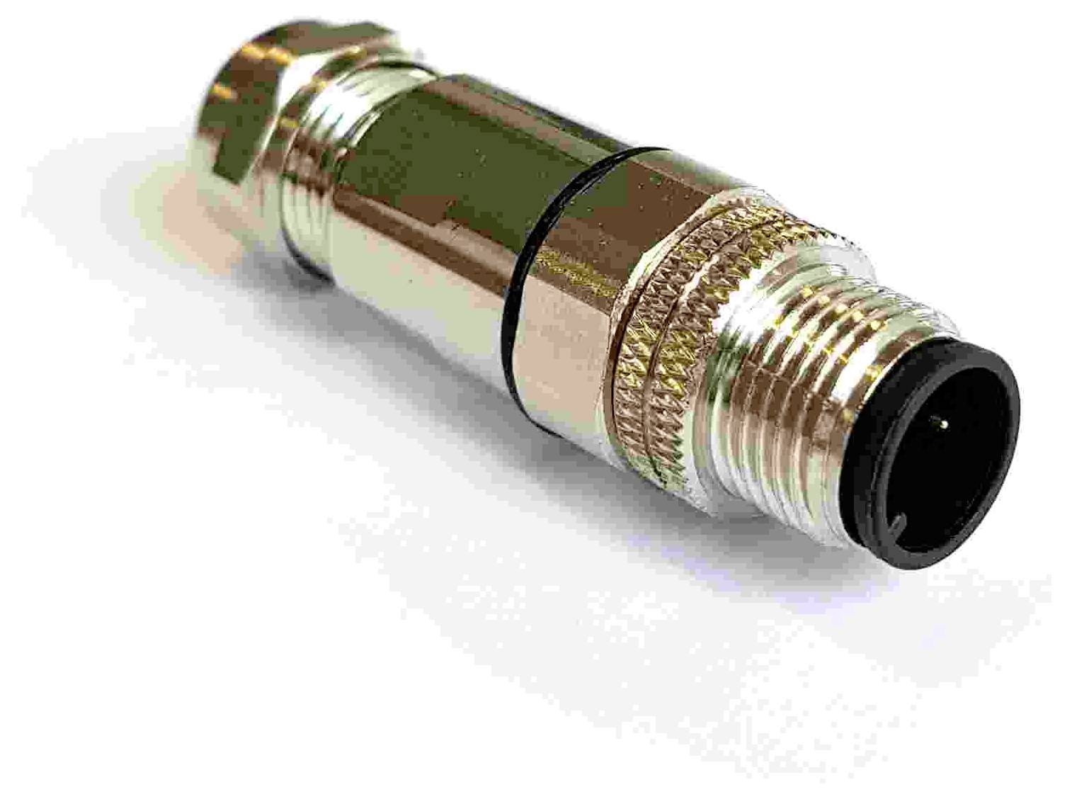 „Ein Gold- und Silbermetallstecker mit gezahntem Griff, mit einem kreisförmigen schwarzen Ende mit vier kleinen Löchern für elektrische Anschlüsse.