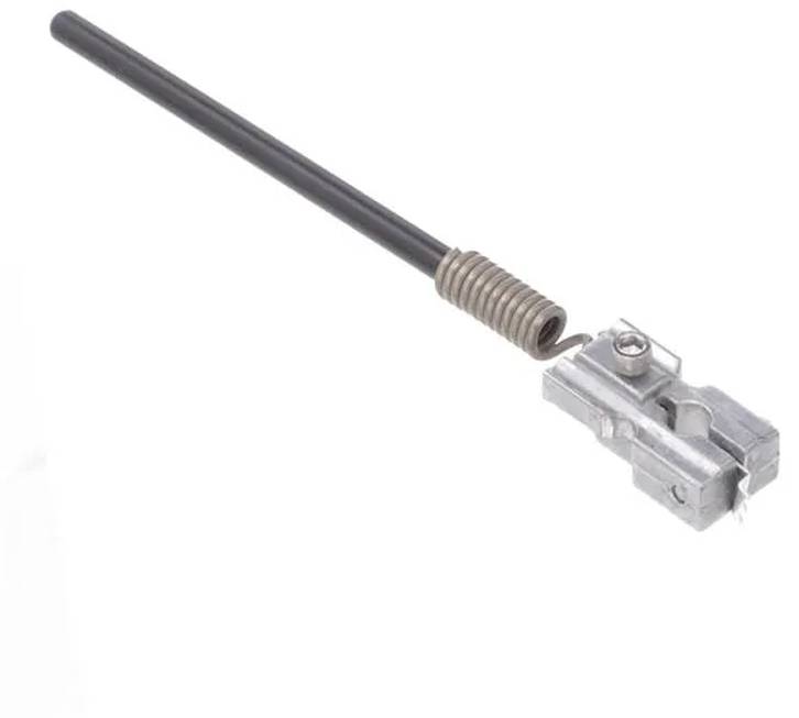 Ein Metallstab mit einer aufgewickelten Feder und einer mechanischen Komponente am Ende, möglicherweise Teil einer Maschine oder eines Werkzeugs zum Einstellen von Mechanismen.