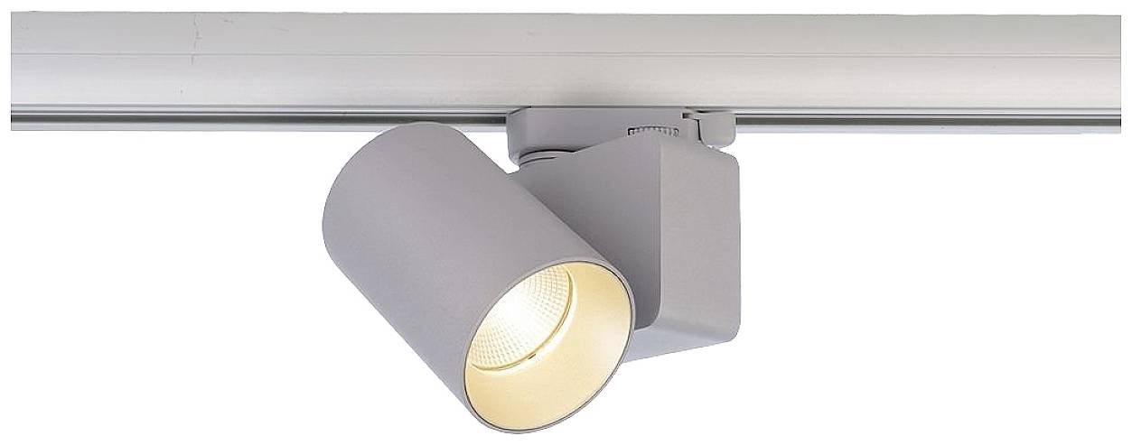 Ein grauer LED-Strahler ist an einer silbernen Schiene montiert und leuchtet nach unten.