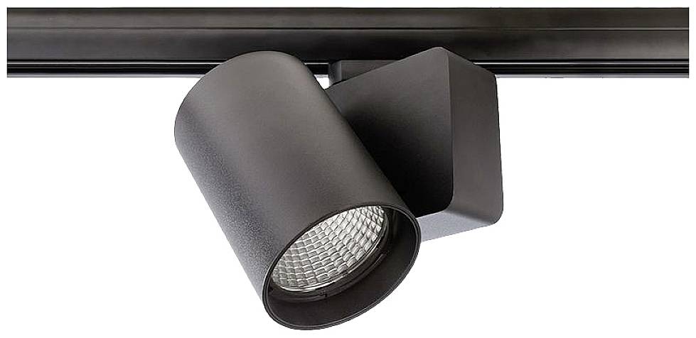 Ein schwarzer Strahler an einer Schiene, beleuchtet gezielt einen Bereich. Ideal für Akzentbeleuchtung in Innenräumen.