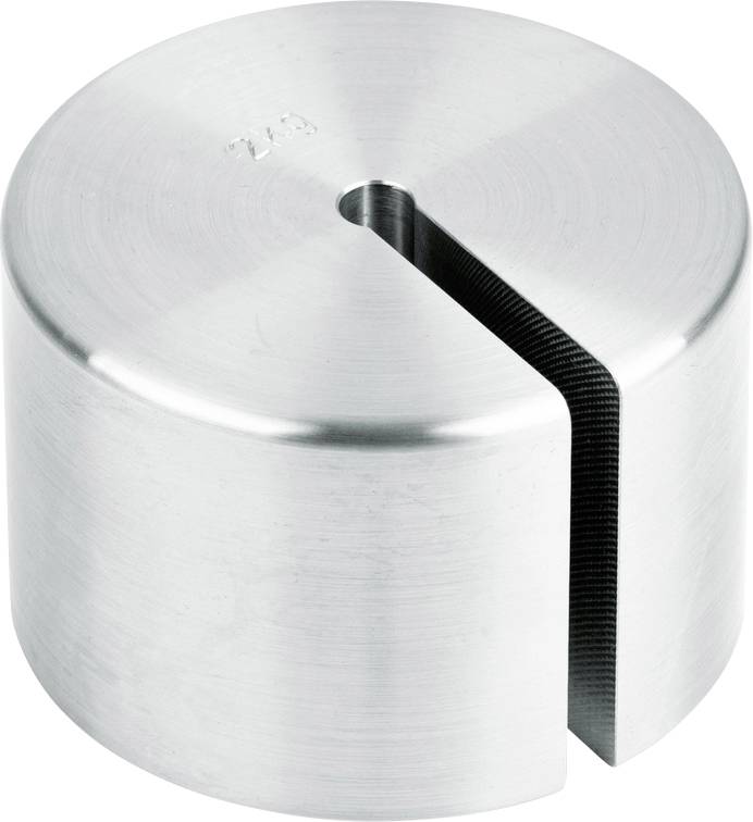 Ein zylindrischer Metallstift mit Schlitz, vermutlich Teil eines mechanischen Geräts, vor neutralem Hintergrund.