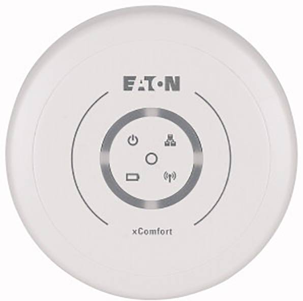 Ein weißer, runder xComfort-Sensor von EATON zur intelligenten Heimautomatisierung mit Symbolen für Strom, Netzwerk, Signal und Batterieanzeige.
