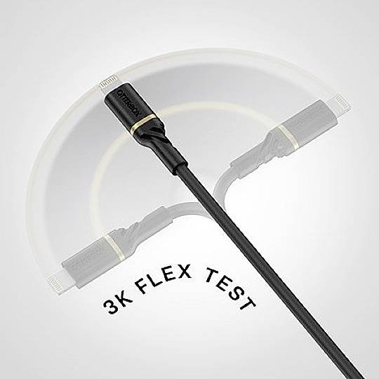 Das Bild zeigt einen Ladekabel-Biegetest. Das Kabel wird in einem Bogen gebogen und ist mit '3K FLEX TEST' beschriftet.
