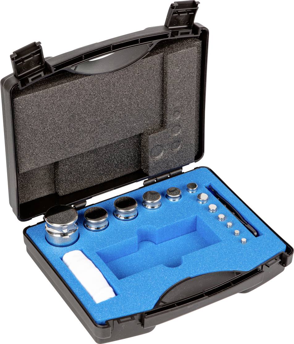 Ein offener schwarzer Koffer mit blauer Schaumstoffeinlage, der verschiedene Metallgewichte enthält.