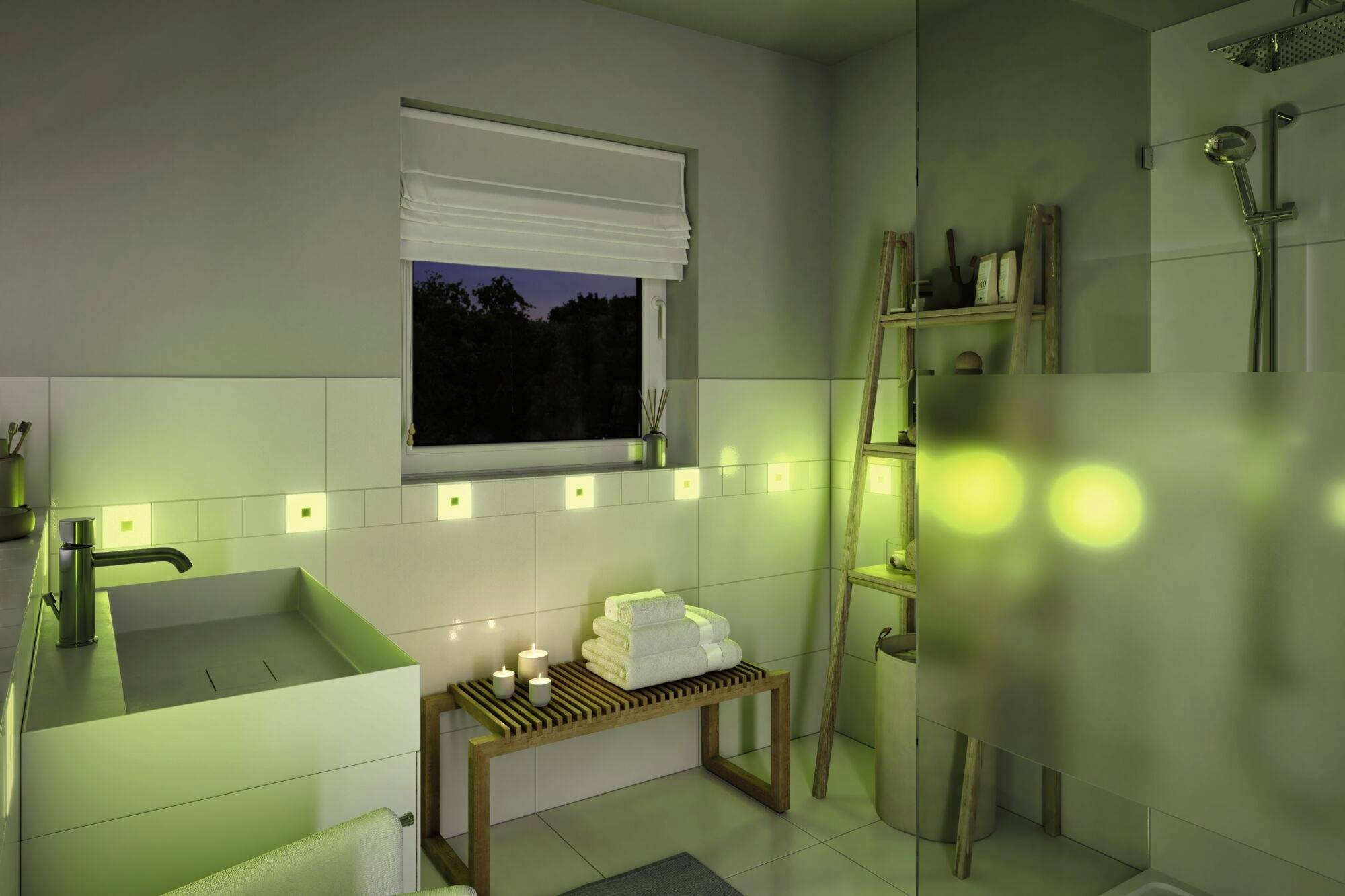 Ein modernes Badezimmer mit stimmungsvoller grüner Beleuchtung, Pflanzen auf einem Regal, einem Waschbecken links und einer Dusche rechts.