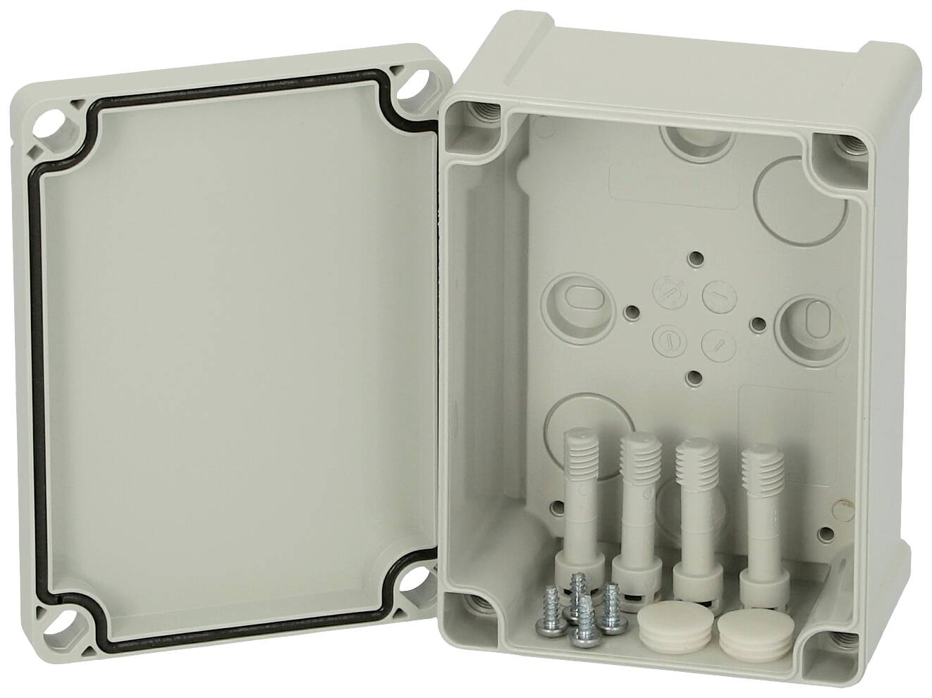 Gehäusekasten aus Kunststoff mit abgenommenem Deckel. Innen sind Schrauben und Kabeldurchführungen sichtbar.