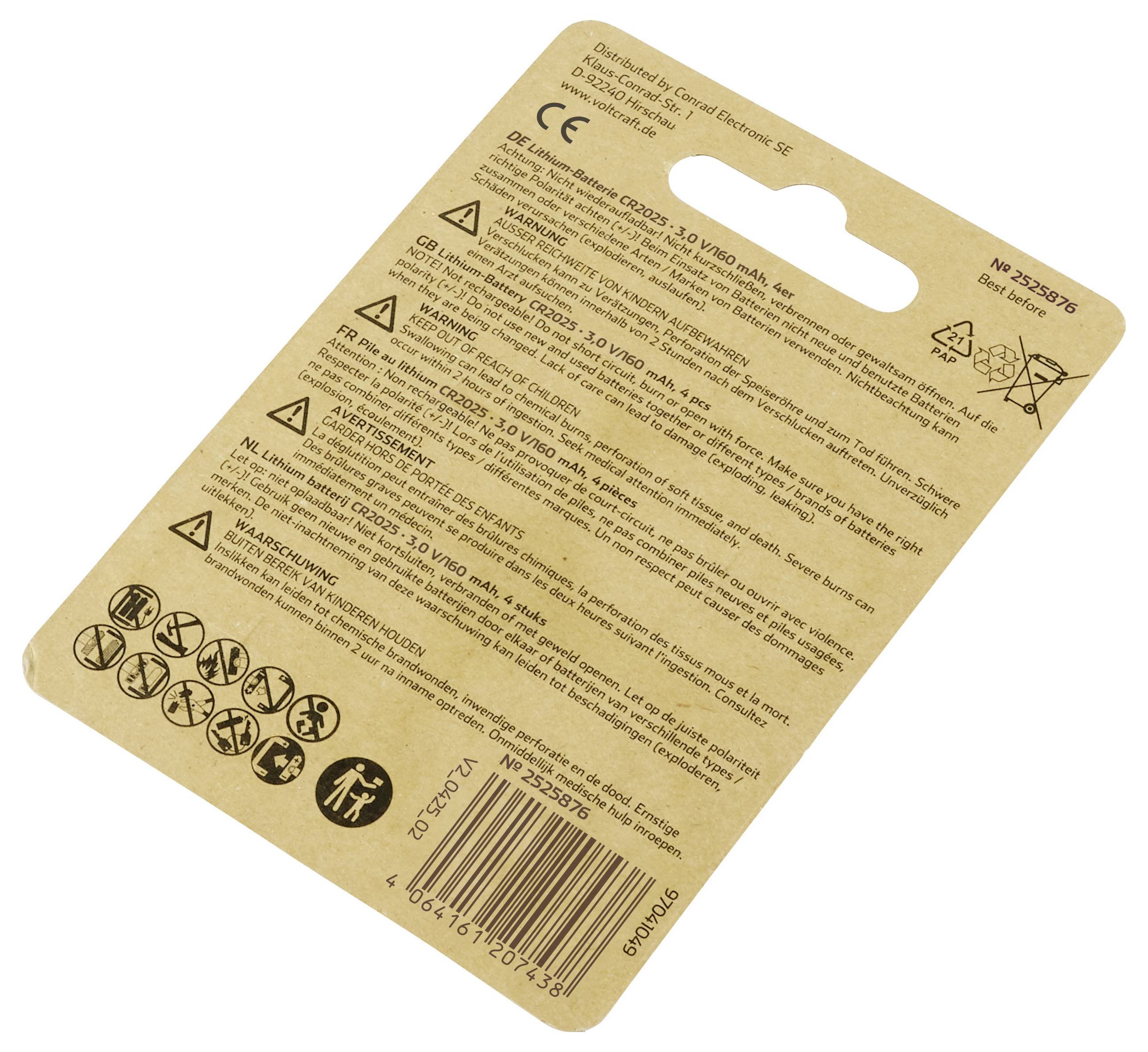 Eine braune Kartonverpackung mit gedrucktem Text, der Warnhinweise, Gebrauchsanweisungen und mehrere Sicherheitssymbole enthält.