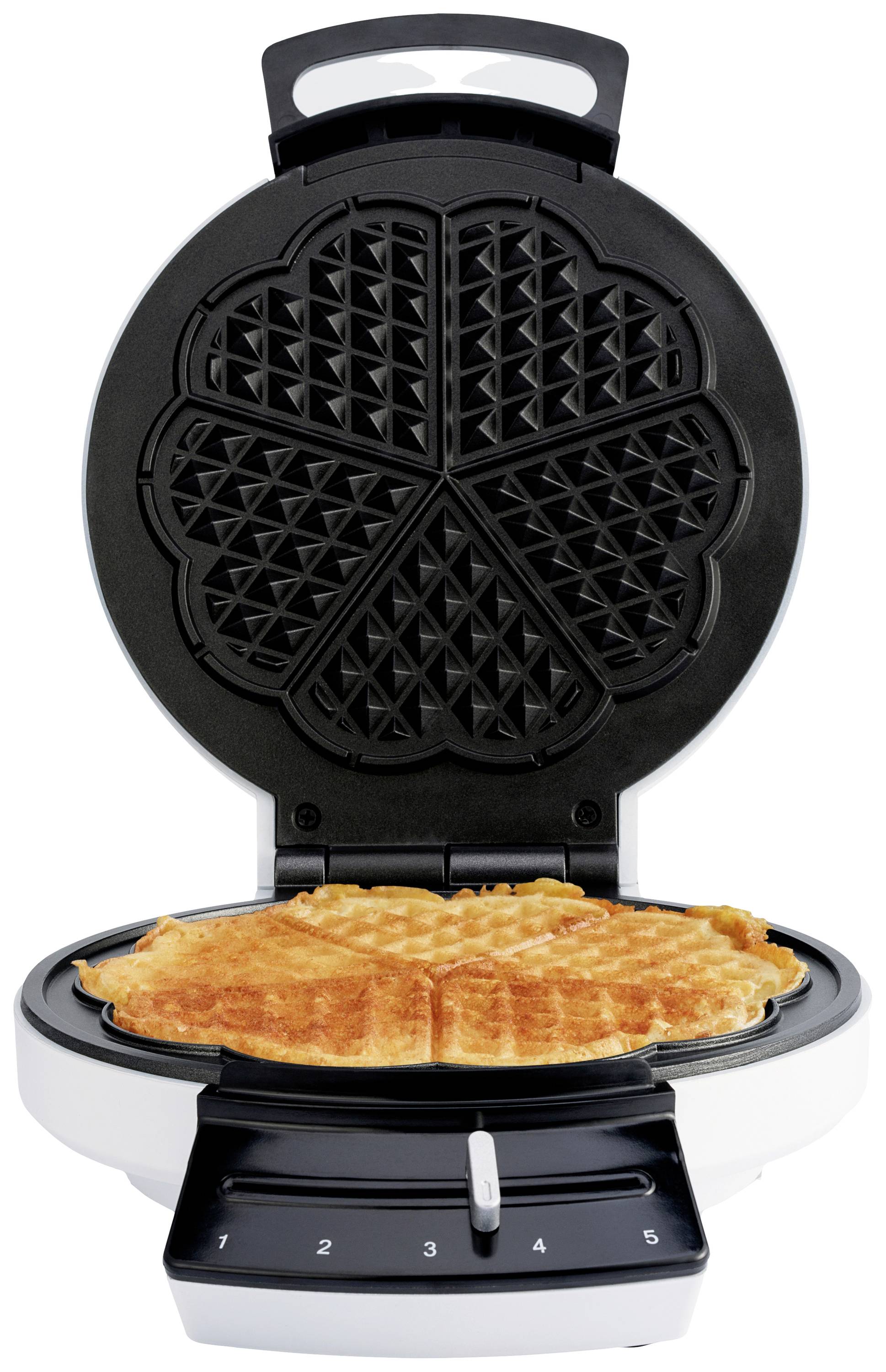 Ein geöffnetes Waffeleisen mit einer gebackenen, goldbraunen Waffel darin. Die Kontrollleiste zeigt die Backstufen 1 bis 5.