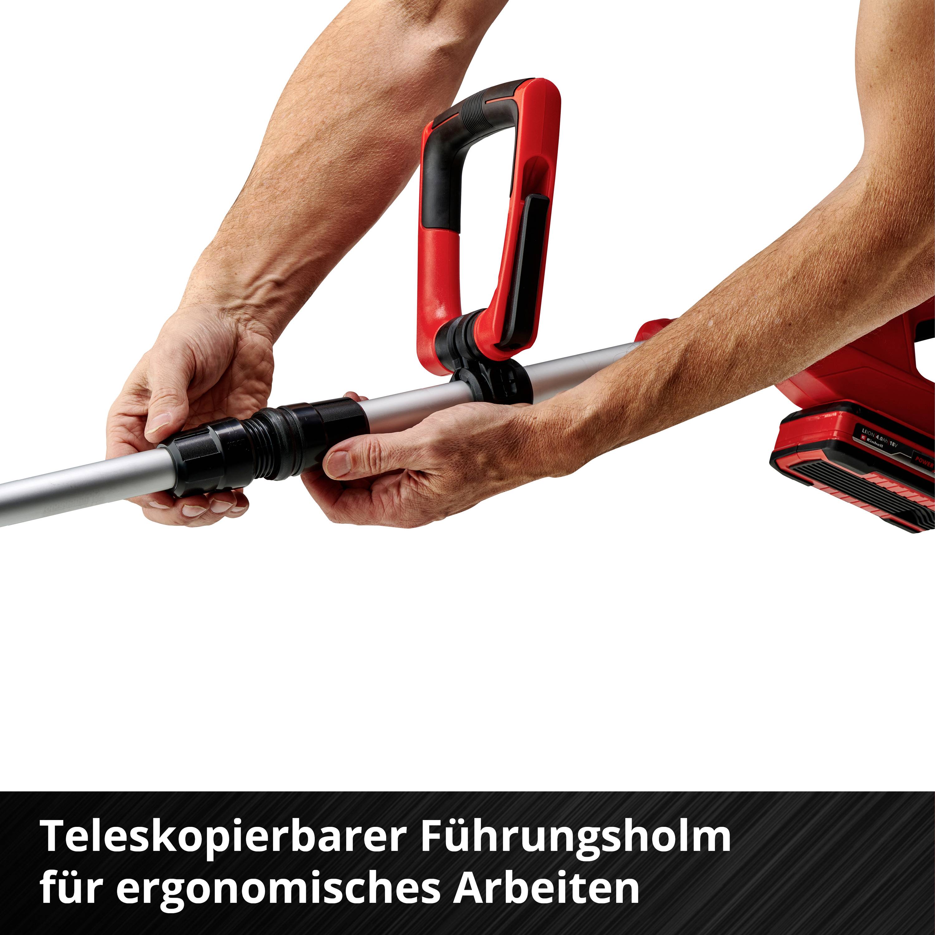 Ein Mann hält einen roten Teleskopierbarer Führungsholm für ergonomisches Arbeiten.