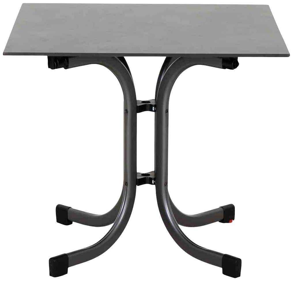 Minimalistischer Tisch mit Metallbeinen und rechteckiger, dunkler Oberfläche.