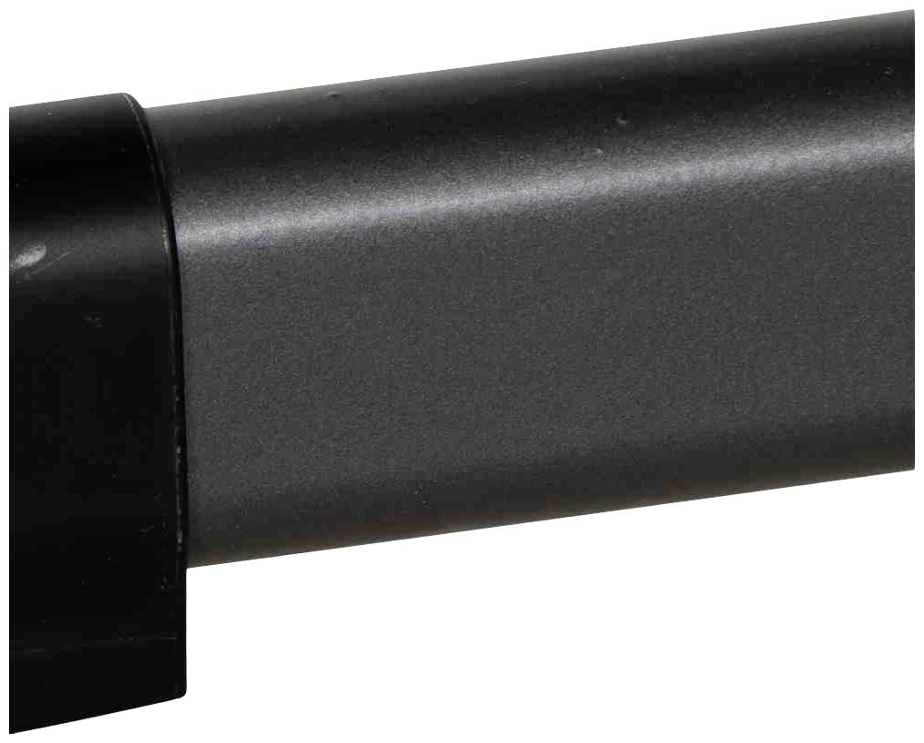 Eine Nahaufnahme eines Teils eines schwarzen, zylindrischen Objekts, möglicherweise ein Teil eines Geräts oder einer Maschine.