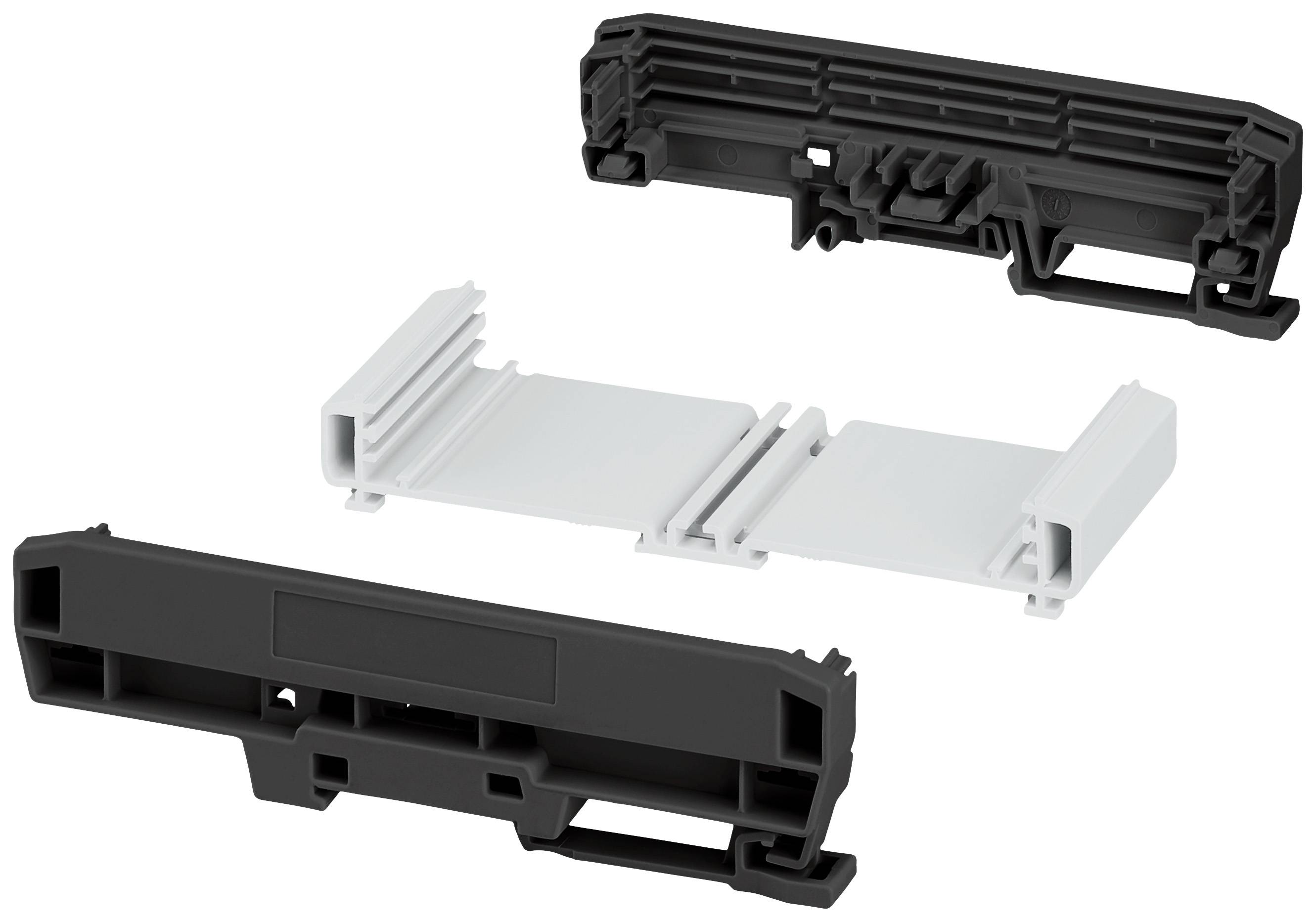 Drei Kunststoffteile eines mechanischen Bauteils in Schwarz und Weiß, angeordnet in einer Dreiecksformation auf weißem Hintergrund.