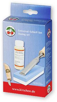 Verpackung eines Universal-Schleif-Sets mit einem Schleifstein, einem Schärföl und einem kleinen Messer abgebildet.