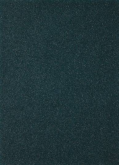 Dunkelgraue Oberfläche mit einer körnigen, sandähnlichen Textur.