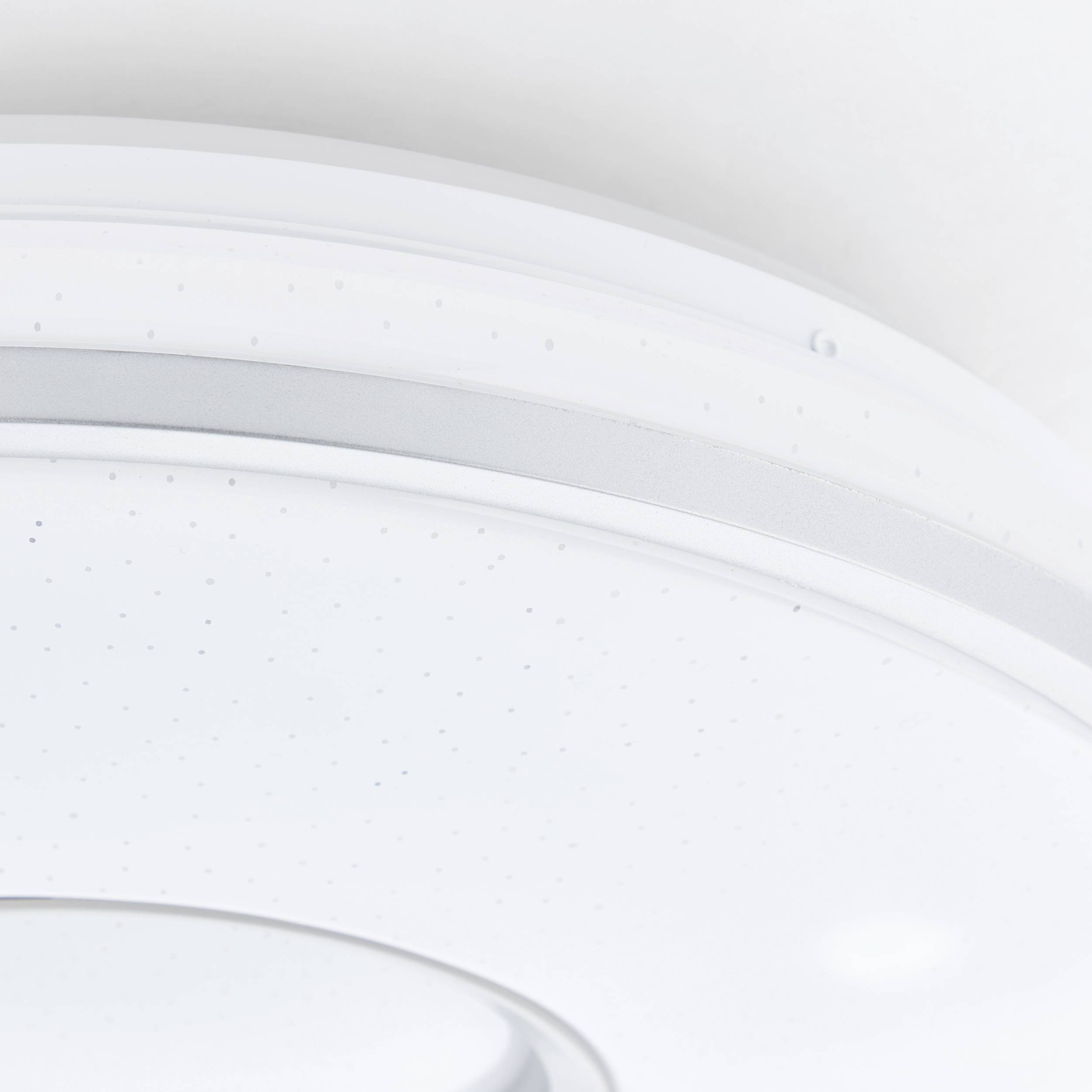 Runde Deckenleuchte mit minimalistischem, weißem Design, geeignet für moderne Wohn- oder Büroräume.