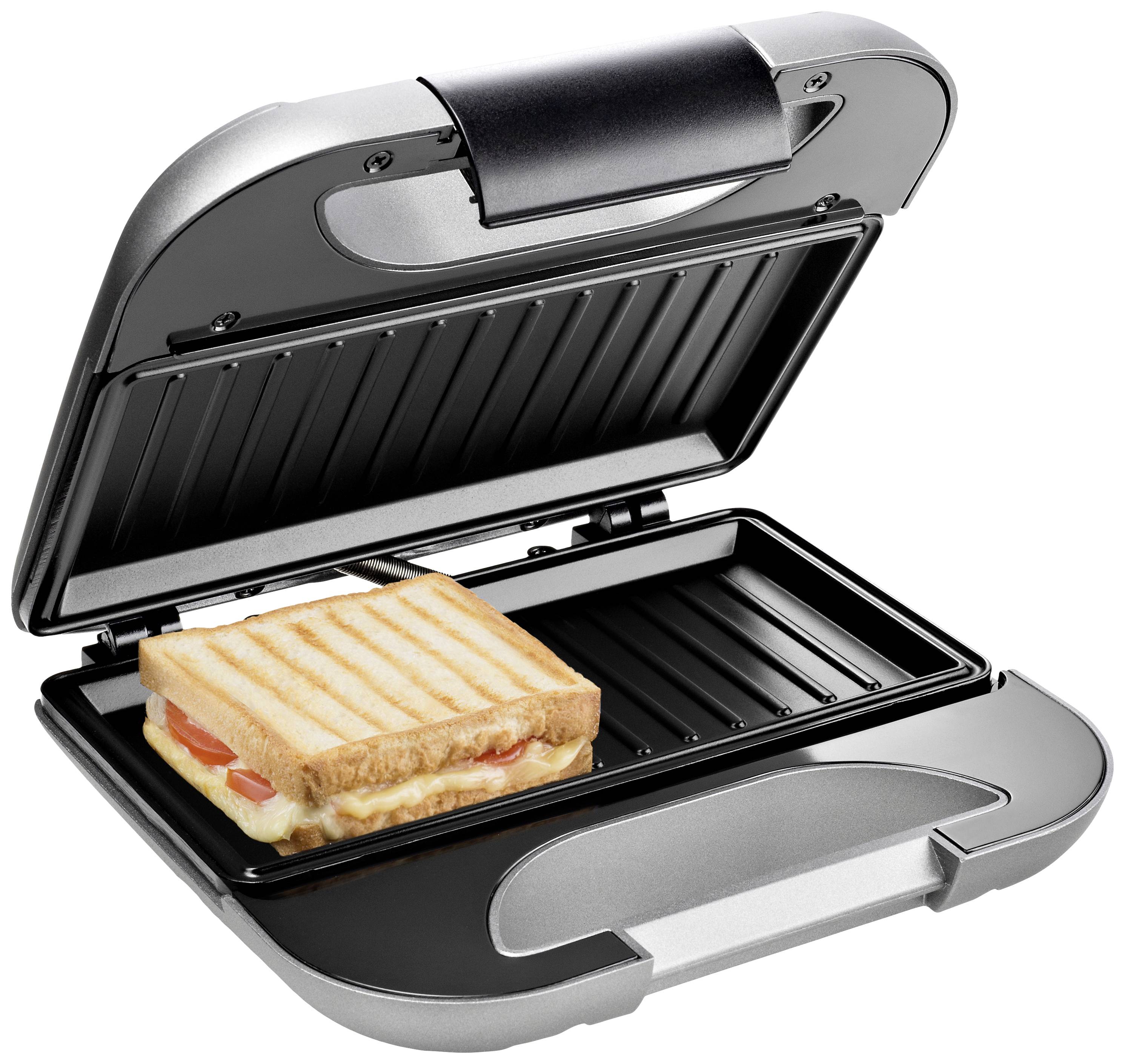 Ein geöffneter Sandwich-Maker mit einem Sandwich aus Toast, Käse und Tomaten auf der Grillplatte.