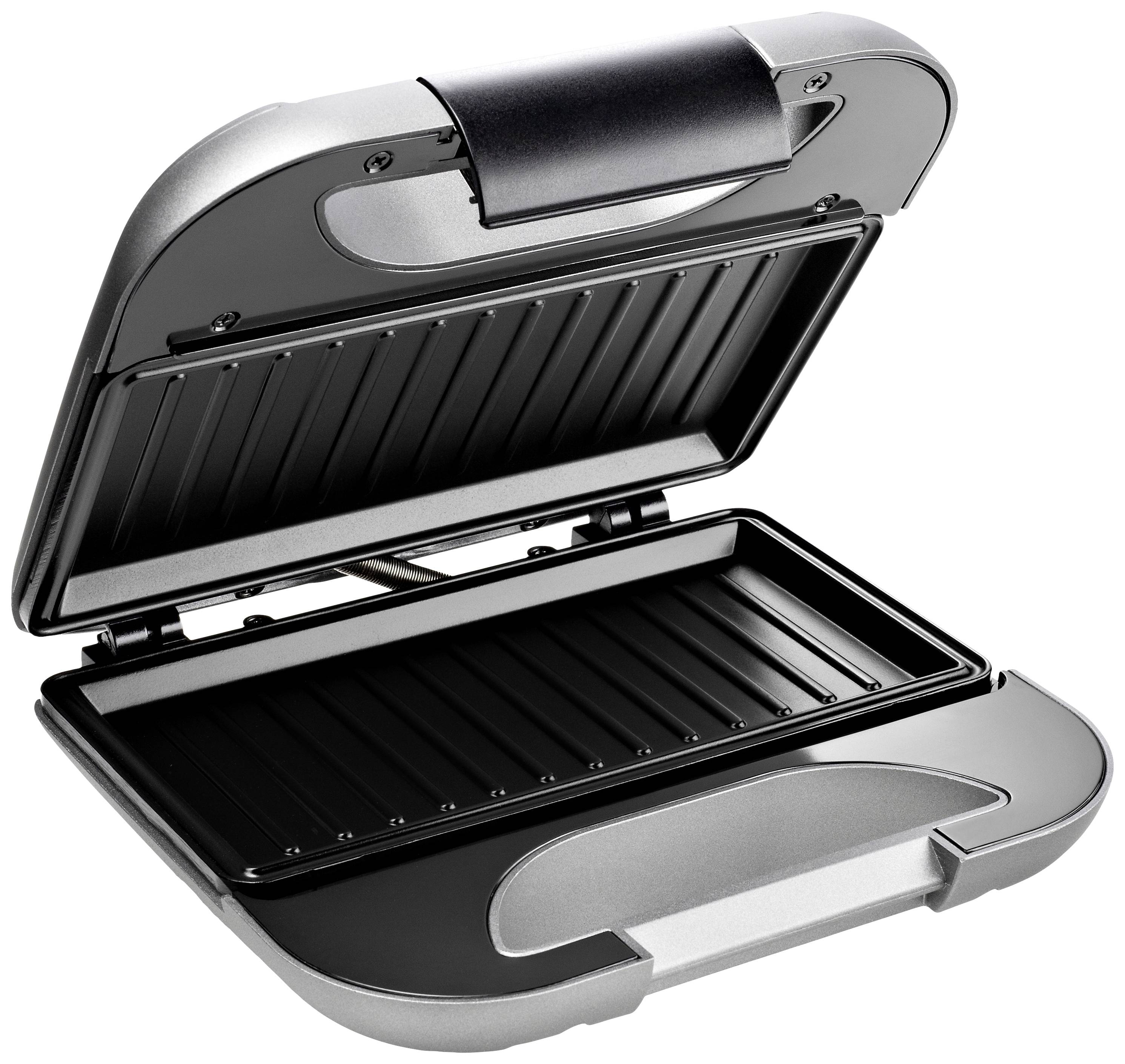 Ein silberner Sandwichmaker mit offenem Deckel zeigt die gerillten Heizplatten im Inneren. Ideal zum Toasten von Sandwiches.