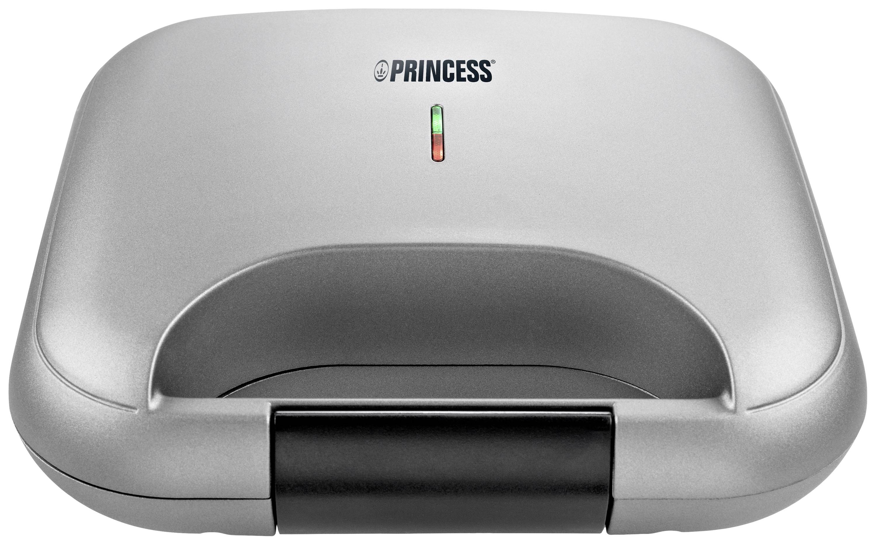 Geschlossener Sandwichmaker mit silbernem Gehäuse und Kontrollleuchte auf der Oberseite.