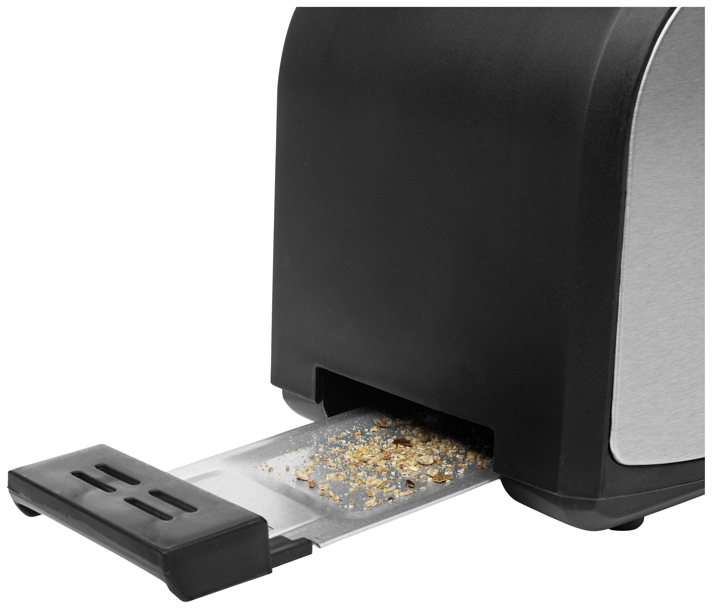 Krümelschublade eines Toasters, ausziehbar mit Krümeln darauf. Sie zeigt die Funktion zur einfachen Reinigung.