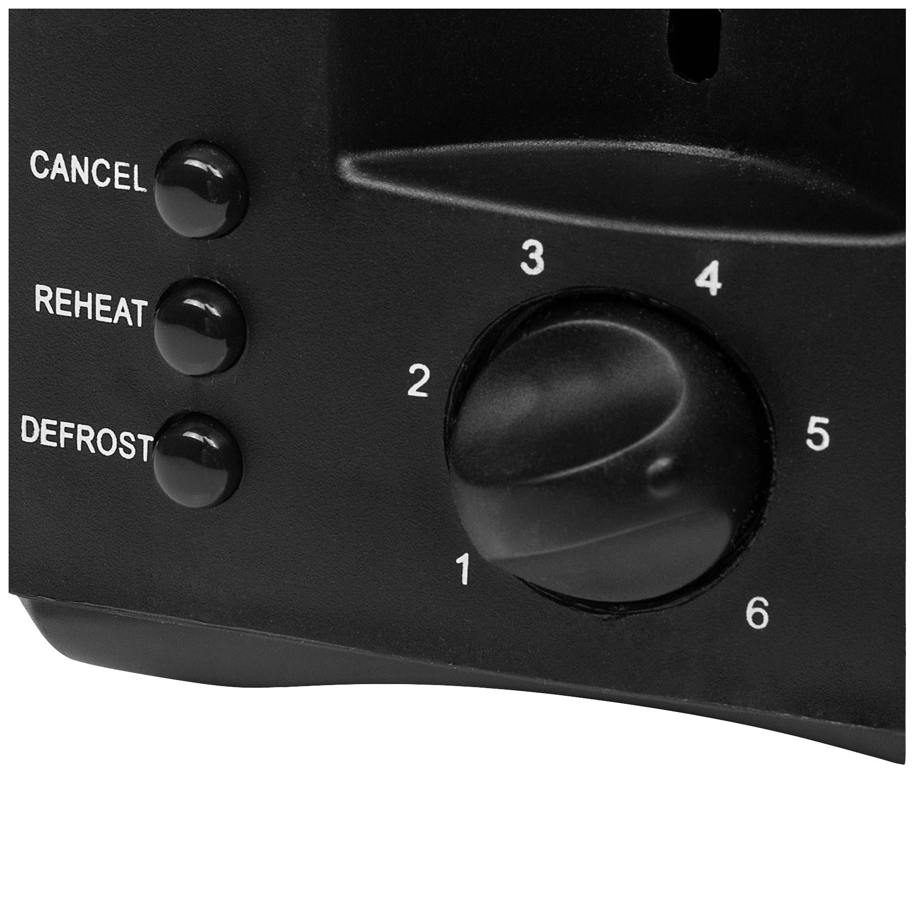 Nahaufnahme eines Toasters: Links befinden sich die Tasten 'Cancel', 'Reheat', 'Defrost'. Rechts ein Temperaturregler von 1 bis 6.
