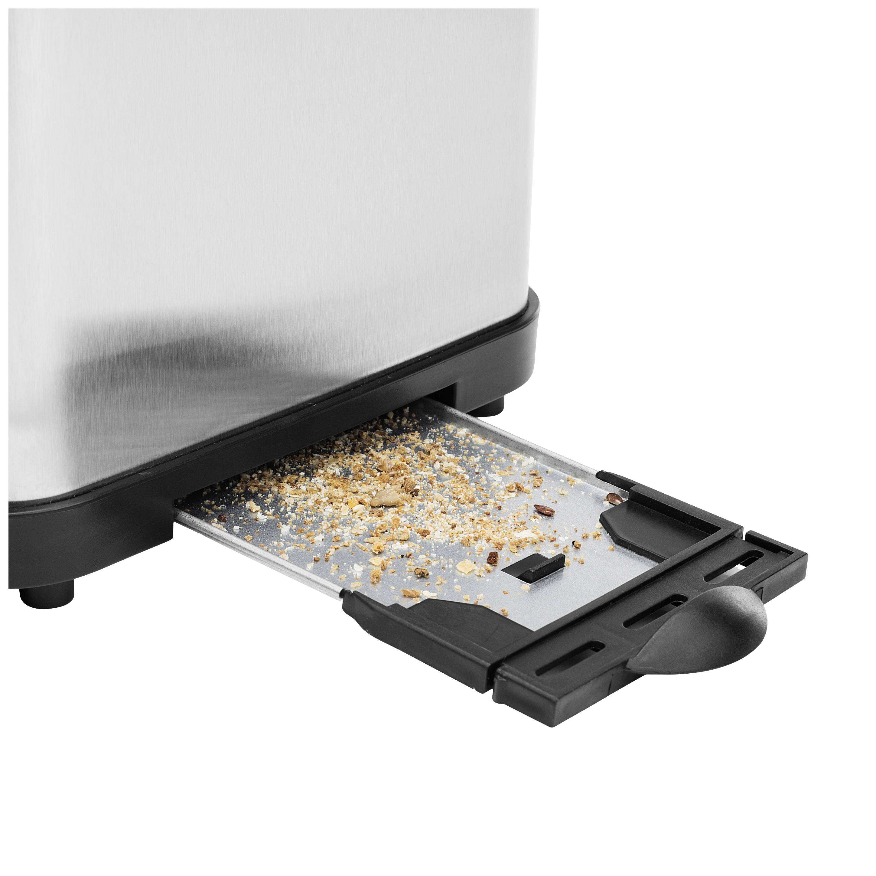 Ein Toaster mit herausgezogener Krümelschublade, gefüllt mit Bröseln.