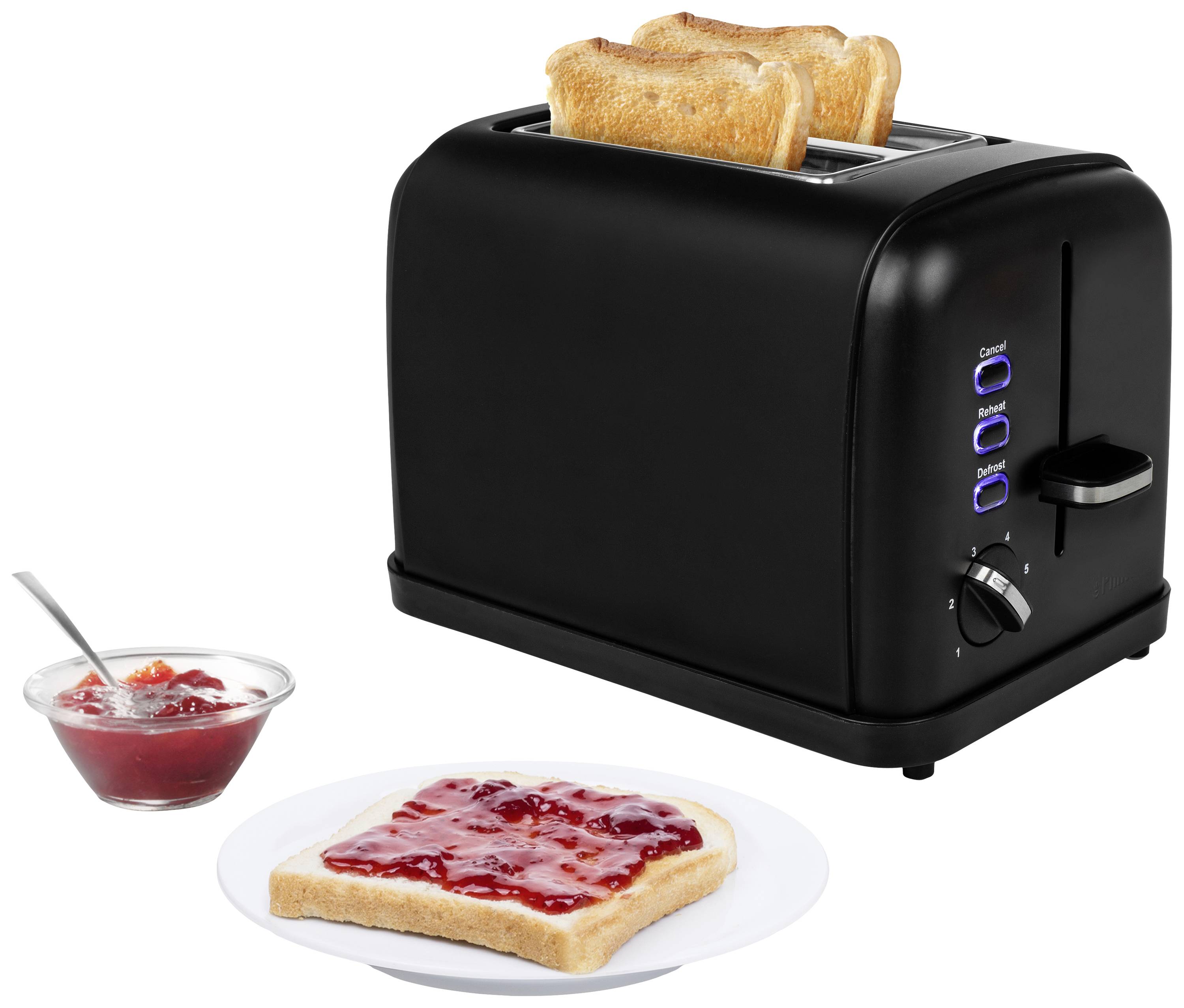 Ein schwarzer Toaster mit zwei Toastscheiben, daneben ein Teller mit Marmeladentoast und eine Schale Marmelade mit Löffel.