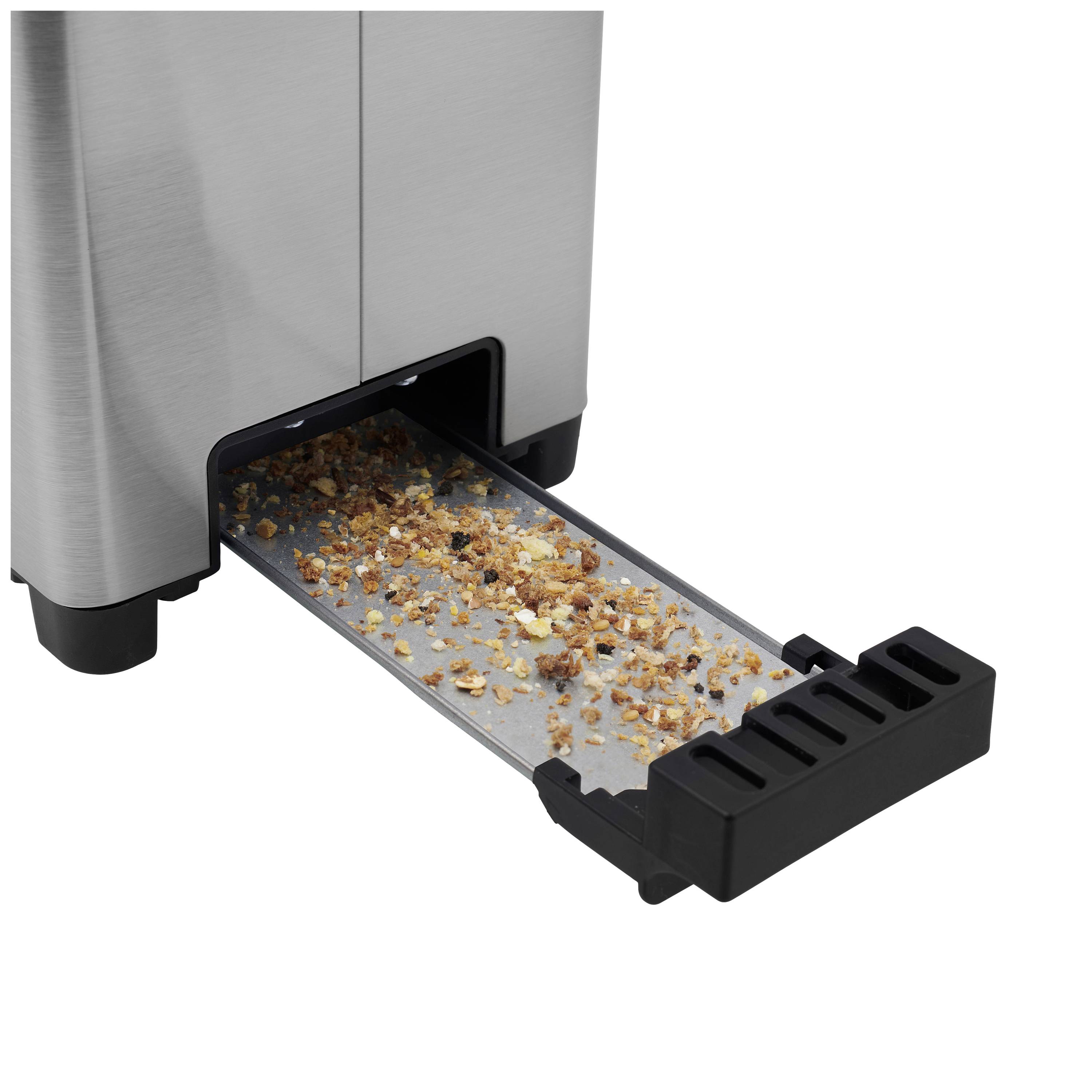 Krümelschublade eines Toasters mit Krümeln gefüllt.