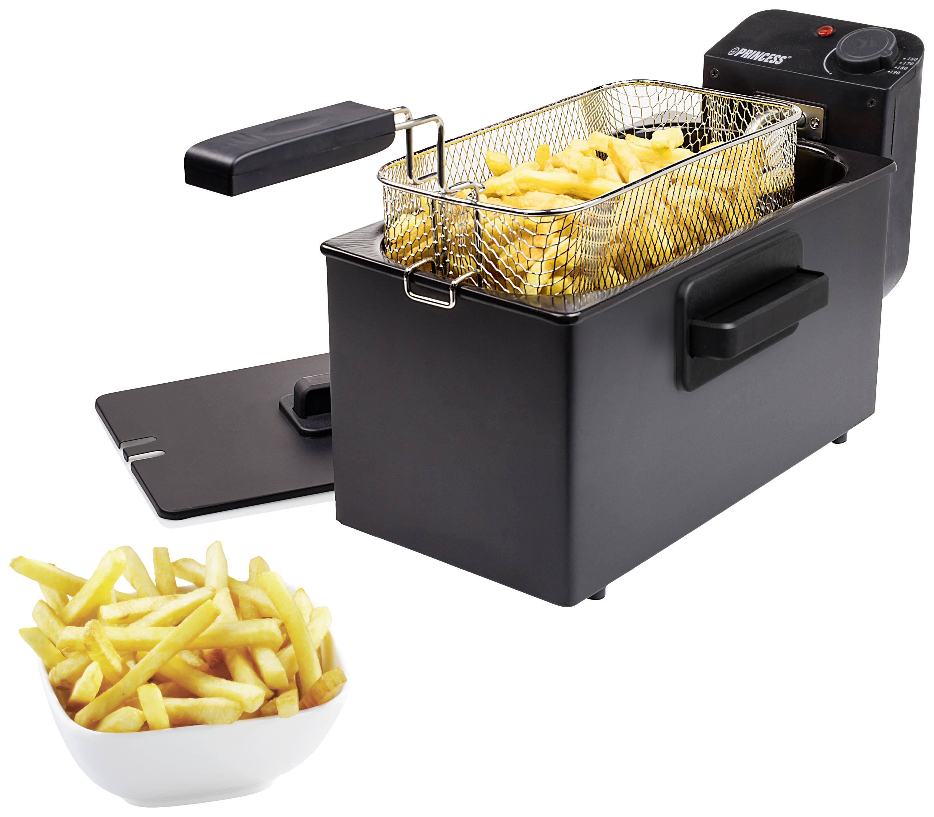 Fritteuse mit Frittierkorb voller Pommes frites, daneben eine Schüssel mit fertigen Pommes.