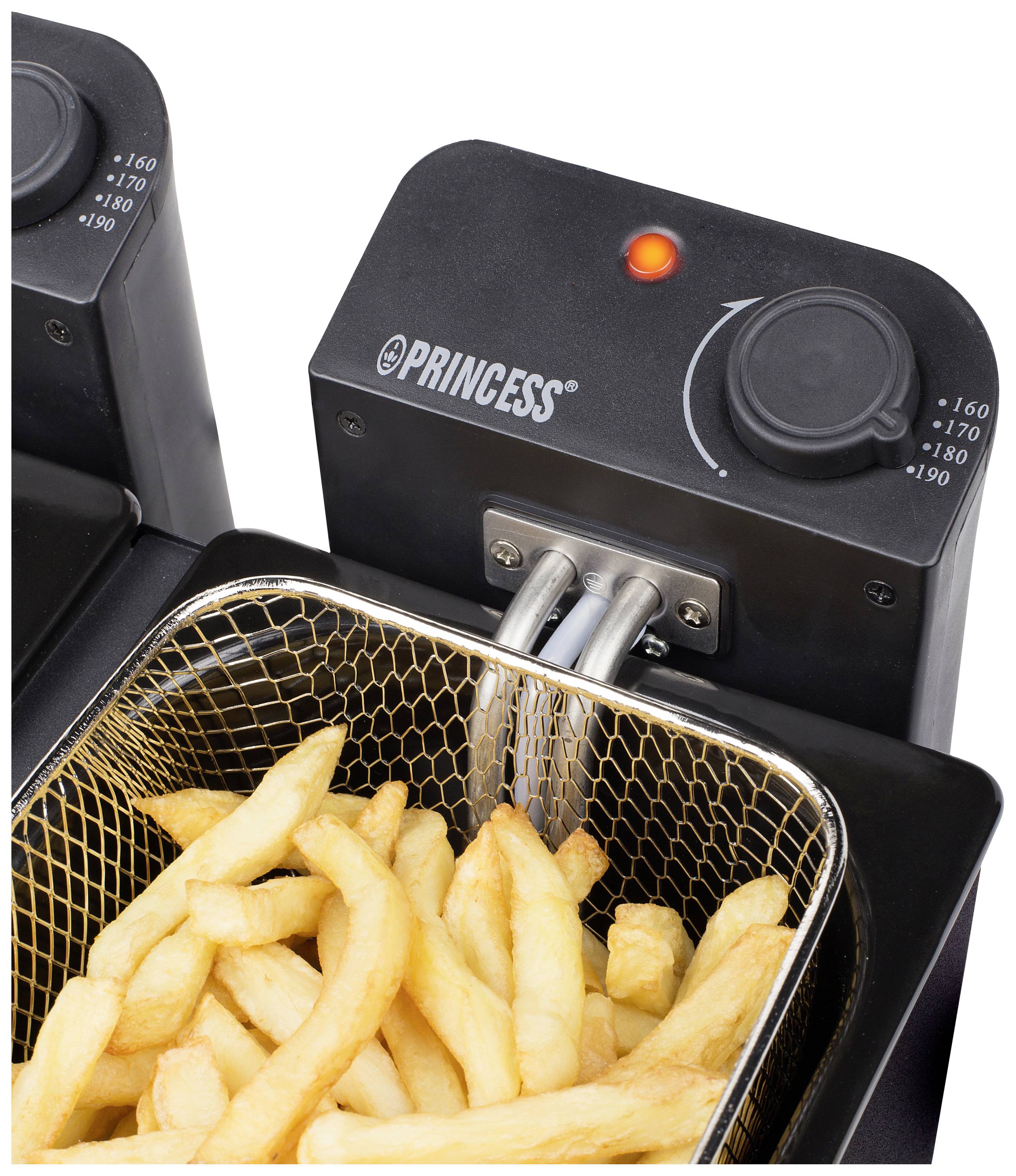 Ein Frittierkorb mit goldgelben Pommes Frites in einer Fritteuse. Die Temperaturregelung zeigt 160 bis 190 Grad Celsius an.